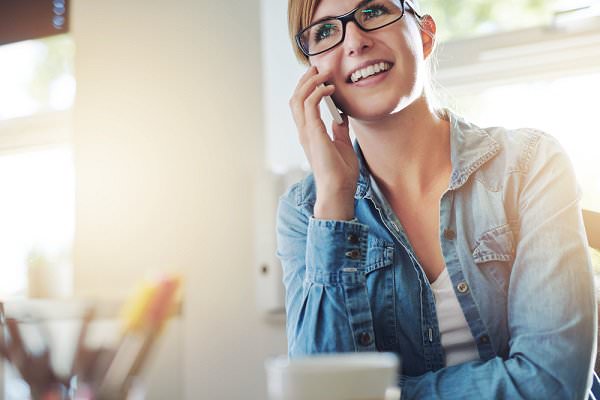 Even just calling a friend to let them know you care about them counts as an act of kindness. (Uber Images/Shutterstock)